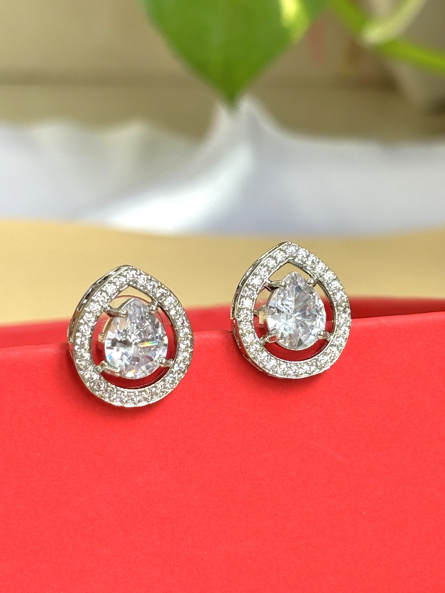 Pear white diamond studd