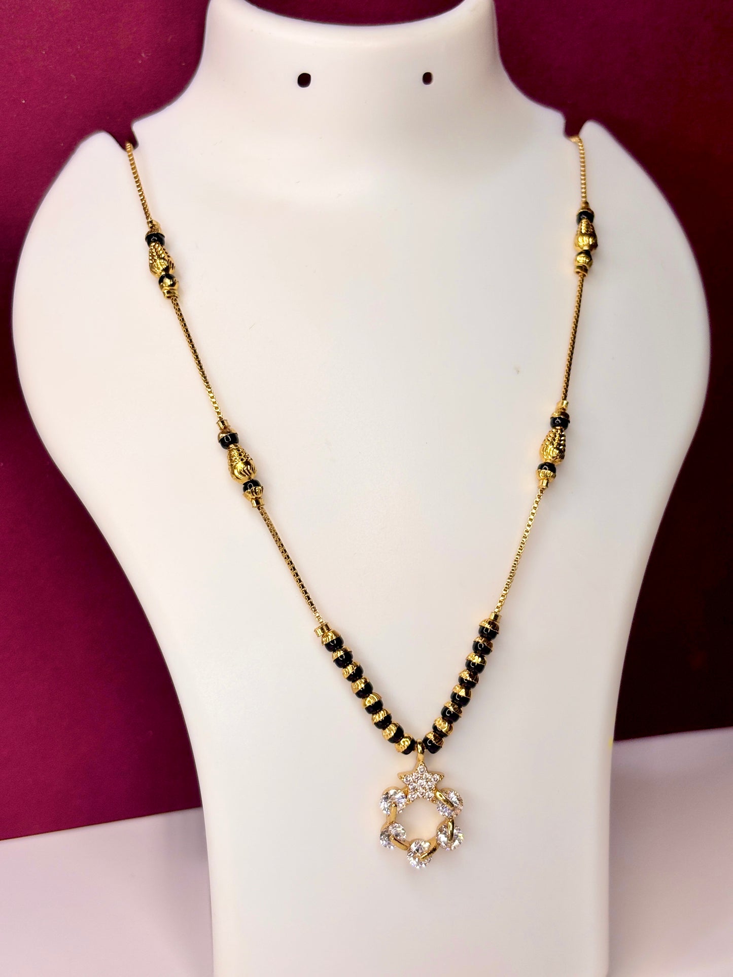Manorama 18 k modern mg