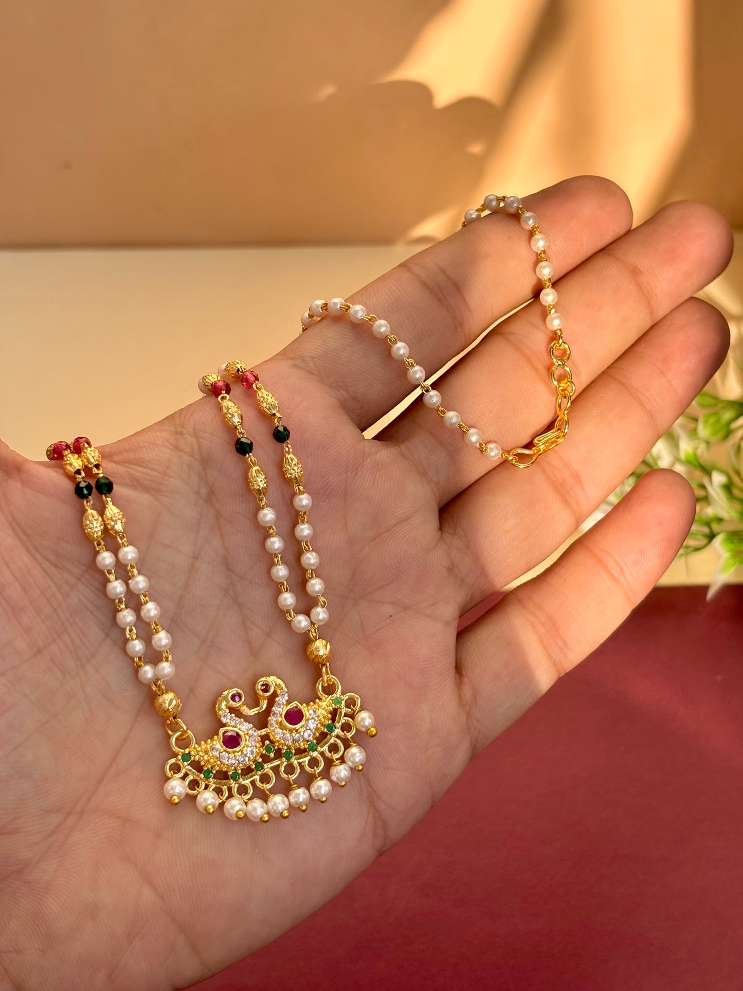 Peacock pearl necklace