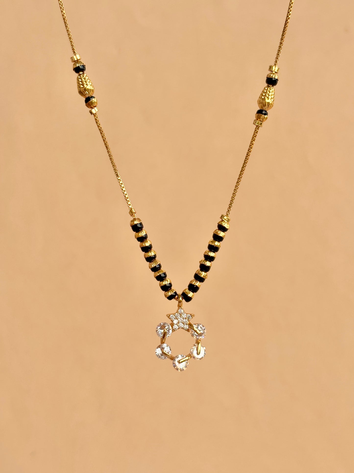 Manorama 18 k modern mg