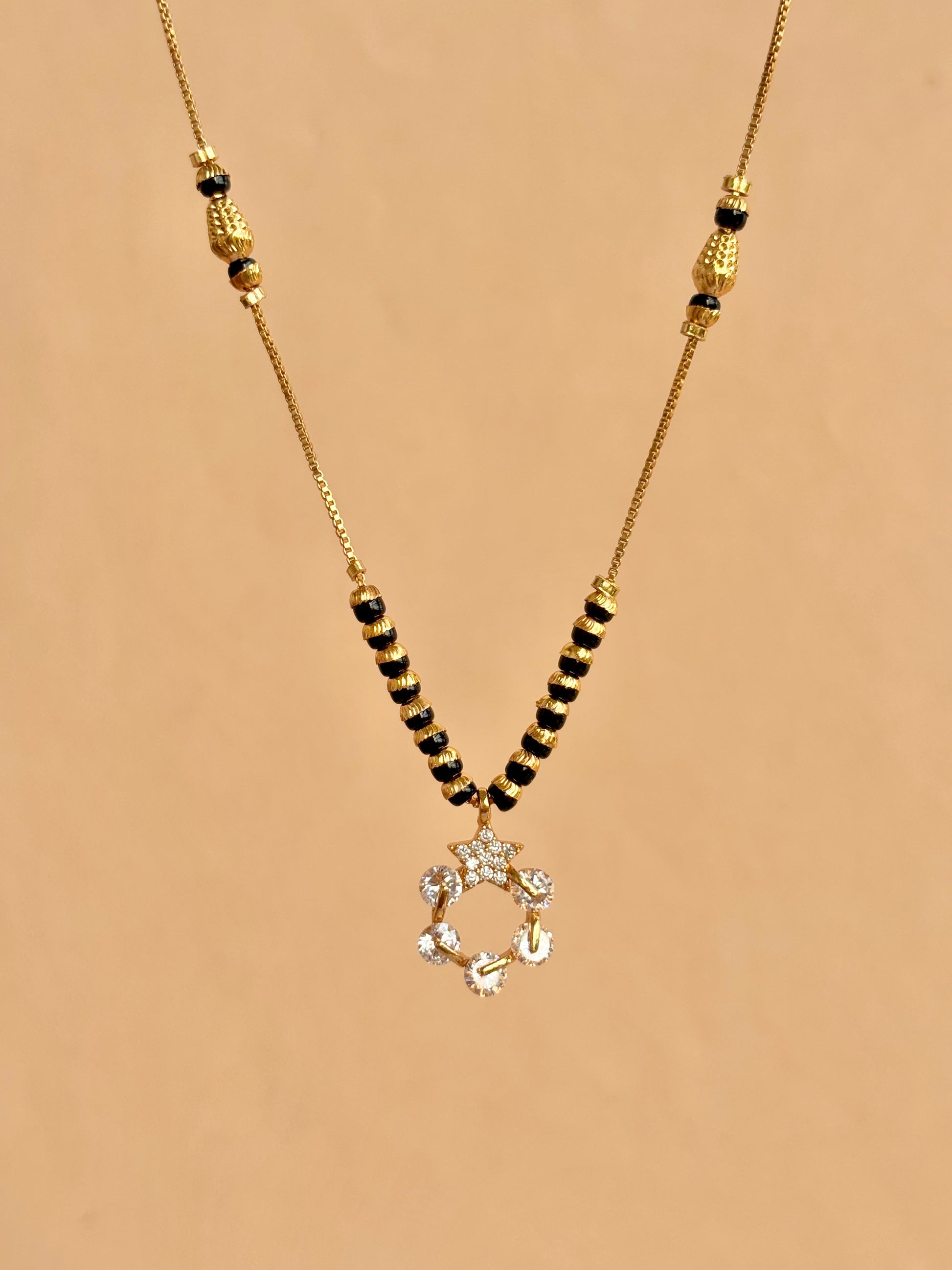 Manorama 18 k modern mg