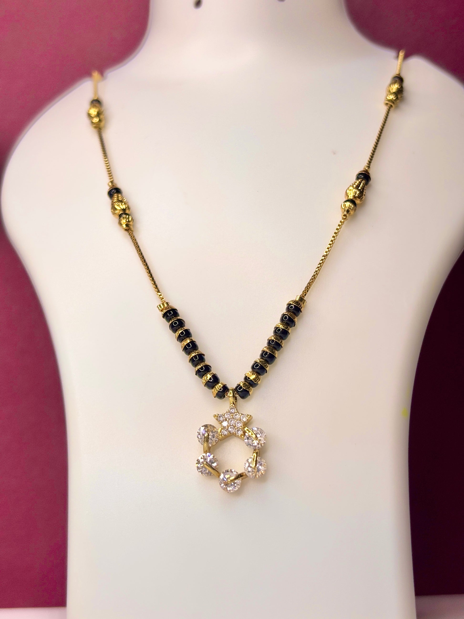 Manorama 18 k modern mg