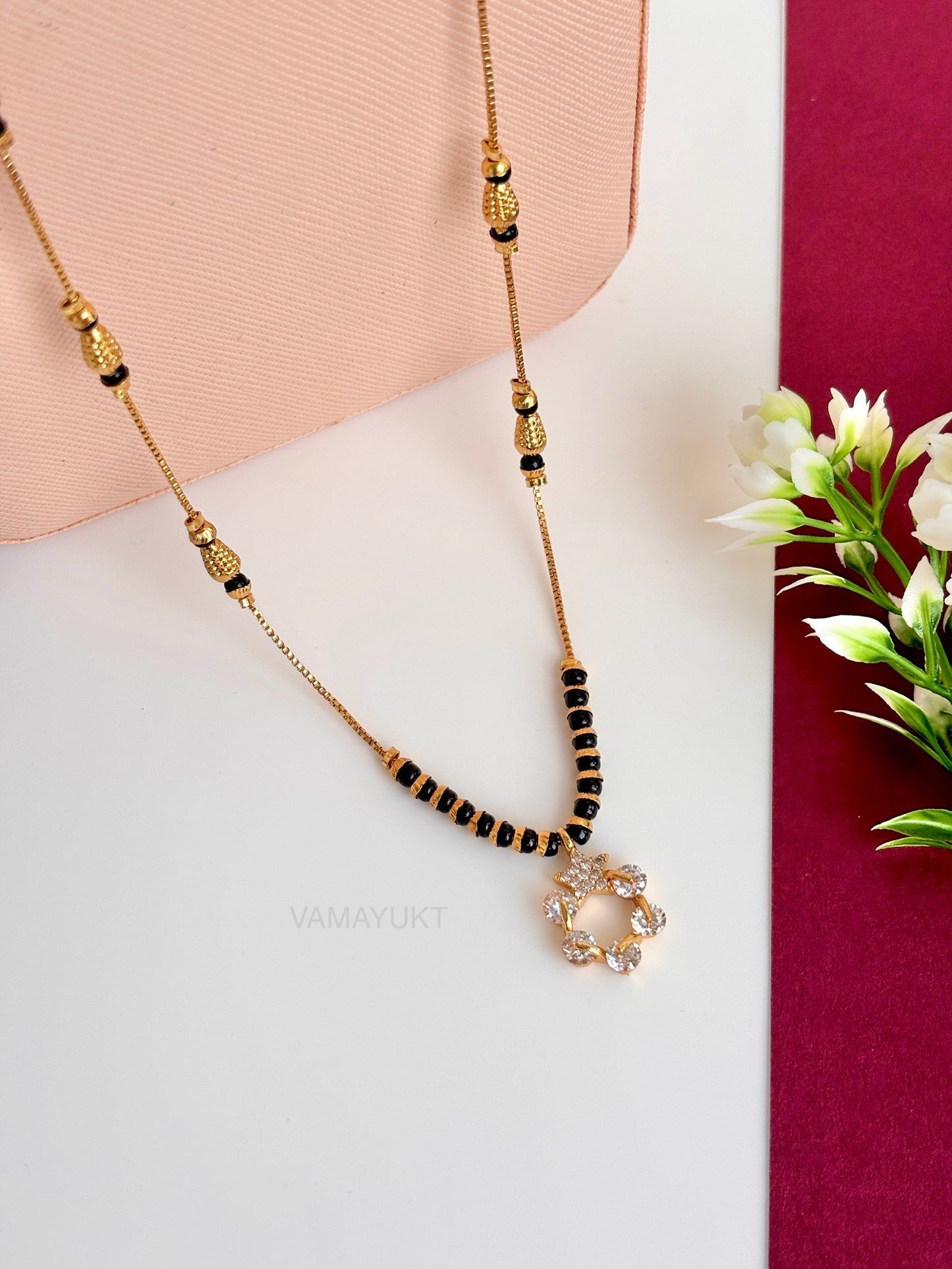 Manorama 18 k modern mg