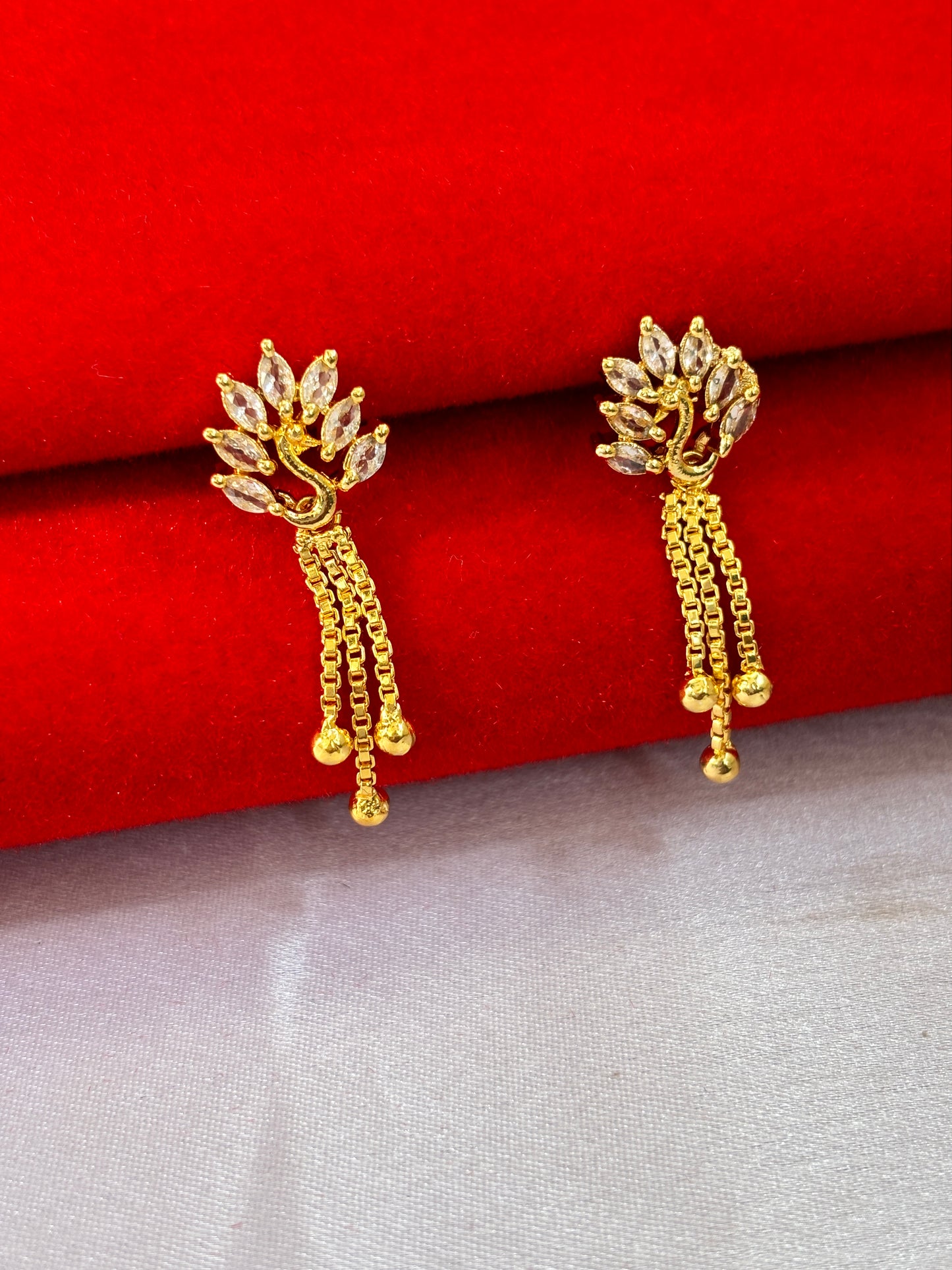 flaunty peacock earirng